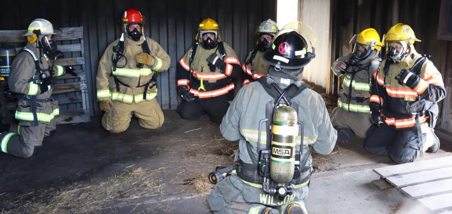 Mullen native Tyrell Wilson (back to the camera) was an instructor for the interior fire and search and rescue training held at Mullen’s fire training center last Saturday, April 12. Wilson is the Fire Safety Lead at Gerald Gentleman Station at Sutherland. Firefighters from Mullen, Thedford, Stapleton, Tryon, Sandhills and Hyannis Volunteer Fire Departments took part in the training. Pictured l-r: Spencer Burk - Thedford, Huck Kemp - Tryon, Jason Brown and Nick Licking - Mullen, Wilson, a Stapleton fireman