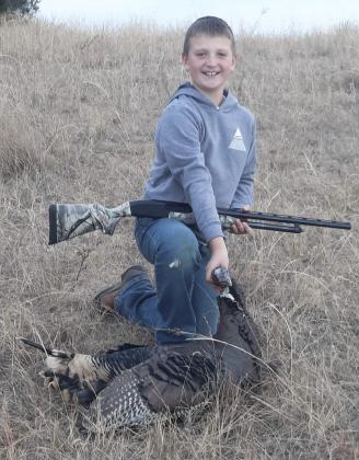 9-year-old Hayden Deibler with his turkey this fall.