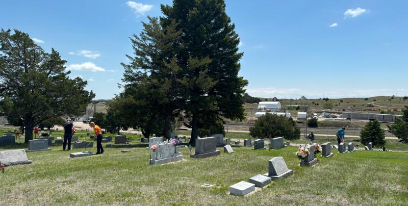 Mullen’s Cedarview Cemetery was buzzing with activity Sunday afternoon, May 19, as over 25 community members of all ages pitched in to help mow, weed eat and dig cactus. The Mullen Commercial Club organized the event and provided lunch for the volunteers. Gerri Peterson