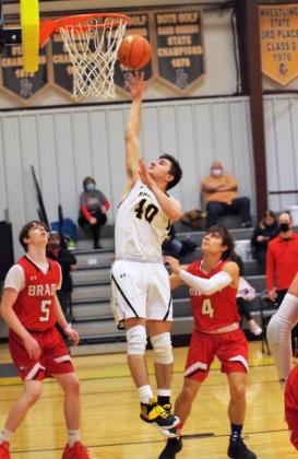 Bryce McIntosh puts up a shot against Brady last Friday. Barb McIntosh