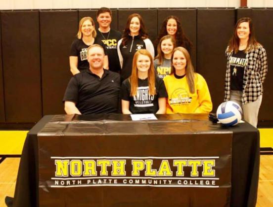 Kylie Licking is pictured seated with her parents, Roger and Sue Licking. Pictured behind her are her brother Kayden and sister Kalli, along with Mullen Head Volleyball Coach Jennifer Moore (far left), Assistant Coaches Mandi Loughran and Kay Dent and NPCC Head Volleyball Coach Alexa McCall (far right). courtesy photo