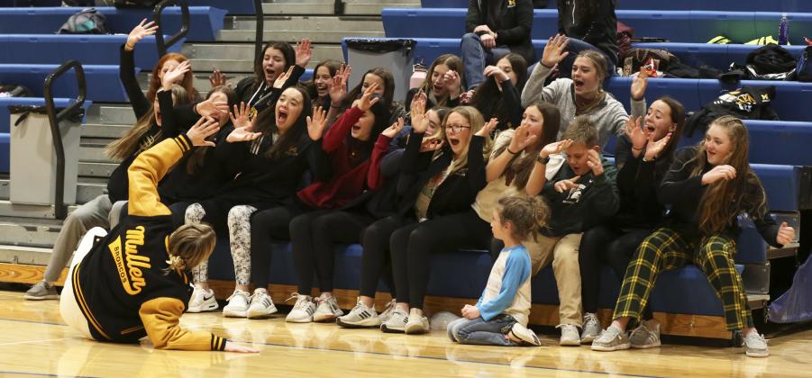 Peyton Paxton takes the student section on a roller coaster ride during the boys’ game at Gordon. Megan Andersen