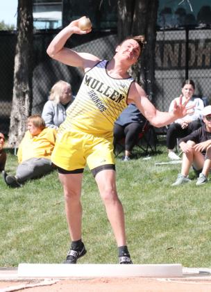 Tate Kvanvig competing in the shot put at Districts last week. Carolee Brown