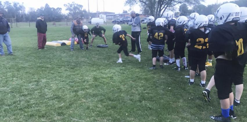 John Howell is guest coach for youth football team