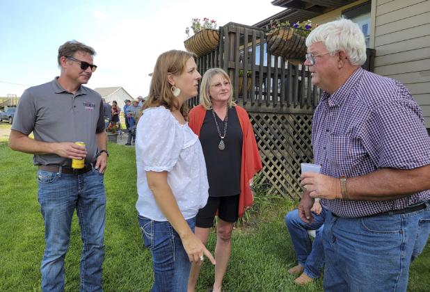 NC member Elizabeth Tegtmeier, North Platte, visits with host John Kraye. Brian Tegtmeier and NC President Brenda Masek listen in. Terri Licking