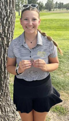Hope Miller with her medal at last week’s golf meet. Bo Cribelli