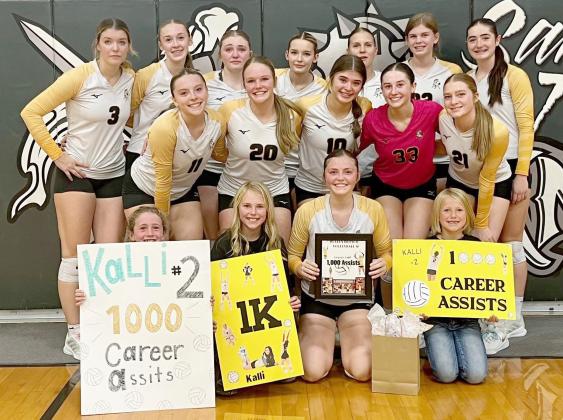 Lady Bronco sophomore setter Kalli Licking got her 1,000th assist in the sub-district final game last week. She is pictured with her teammates, back l-r: Medora DeNaeyer, Sydnee Cheever, Hayley Donohoe, Maggie Haesler, Brynne McCully, Chloe Newman, Jenna Donohoe. Middle: Izzy Hoyt, Emerson Thorberg, Ella Rice, Allie Boyer, Lola Wingebach. Front: Dailie Dent, Ayden Lee, Kalli, Fallon Lee. Sue Licking