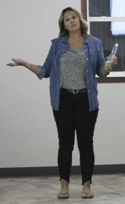 Ashley Hegland waits for the judges’ call to see if she won money in cornhole Saturday night - she did!