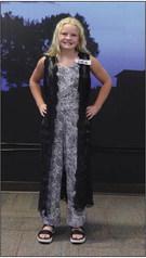 Ava Walz received a purple ribbon modeling her Shopping in Style purchased outfit. courtesy photos