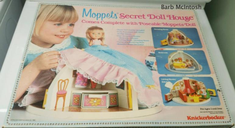 The Moppets’ Secret Doll House box is unwrapped every year. courtesy photo
