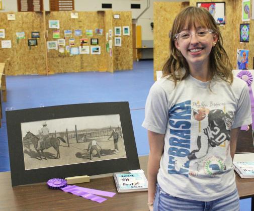MHS senior Malia Oltmer pictured with her Best of Show piece. Gerri Peterson