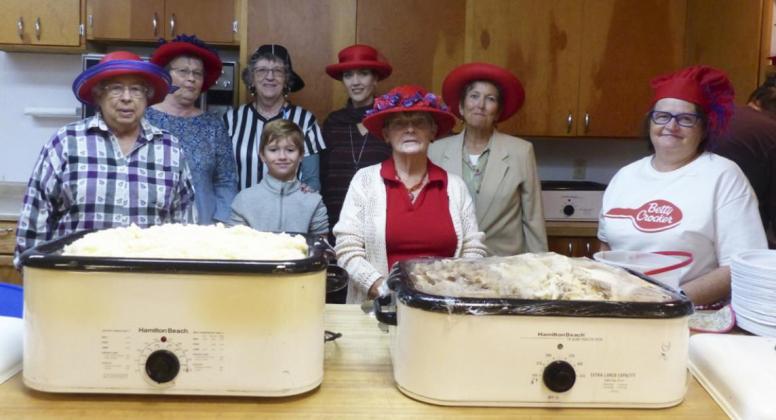 Volunteers before the feast, l-r: Marla Sonnefelt, Deb Daly, Mary Lou Harding, Cruz Sack, Christine Sack, Donna Reynolds, Wanda Simonson, Connie Broweleit. Terri Licking