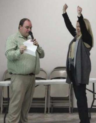 Jennifer Peters reacts to finding out that the envelope she chose was worth $50.