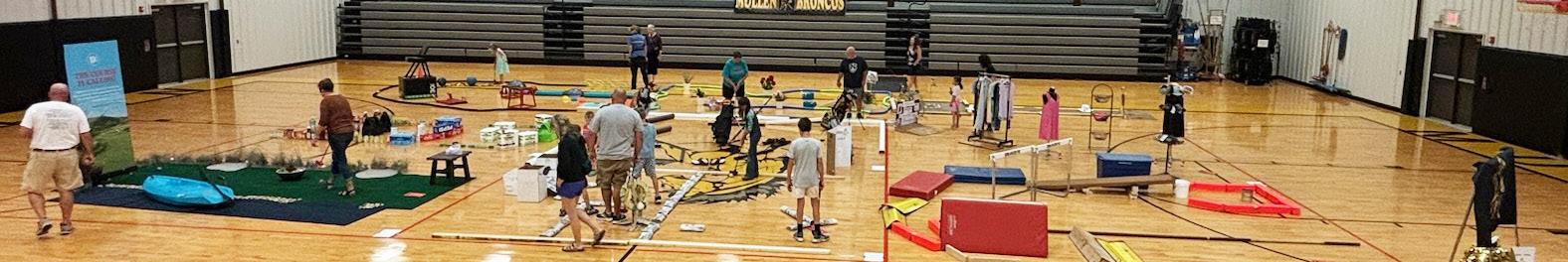 The creativity was endless at the 9-hole miniature golf course set up at the Hilltop Gym last Friday, June 7 during the alumni festivities. Mullen businesses out-did themselves.