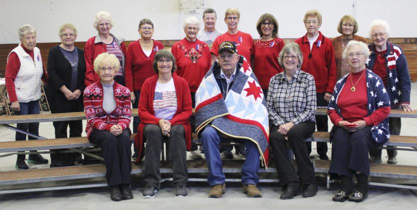 Jon Harding is pictured with the American Legion Auxiliary women following the Veterans Day program on Friday, Nov. 10, back l-r: Sherron Sullivan, Nancy Hicks, Mary Jane Younkin, Sue Bonesteel, Alice Phipps, Carol Wright, Kathie Hassett, Marylin Ericksen, Mildred Szwanek, Cathy Nichols, Winnie Cooley. Front: Kathy Tuton, Eva Crawford, Jon, Mary Lou Harding and Doris Starr. Gerri Peterson