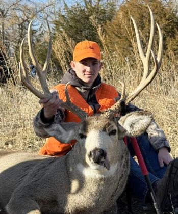 Cayden Hampton with his muley during rifle season.
