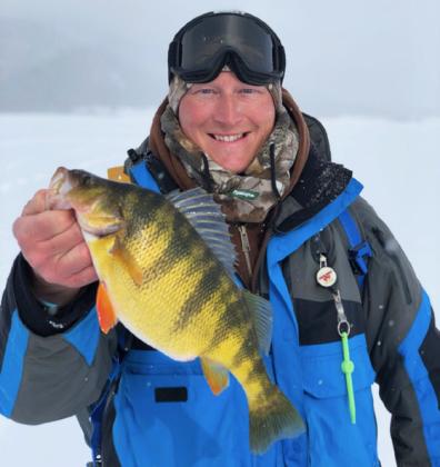 Dane Peterson ice fishing for perch in Cascade, Idaho.