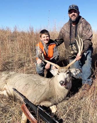 Ransom O’Brien and his dad Chris with Ransom’s first deer.