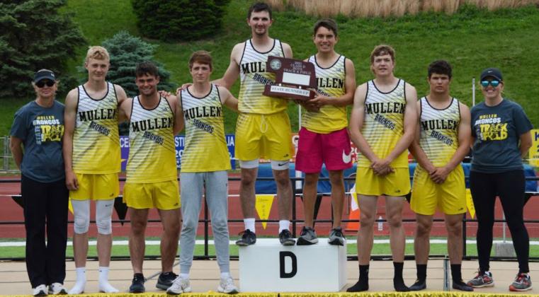 . Below: Mullen Bronco boys competing at State Track with the Class D Runners-up trophy, pictured l-r: Head Coach Jennifer Moore, Clayton Moore, Samuel Coble, Chase Gracey, Bryce McIntosh, Trevor Kuncl, Jaden Emerson, Spencer DeNaeyer, Assistant Coach Sarah Hardin. photos by Kaleb Moore