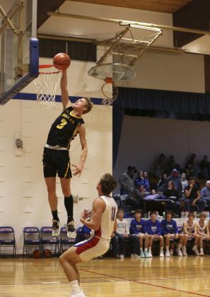 Clayton Moore with a dunk at Arthur. Megan Andersen