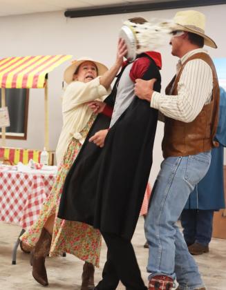 There were plenty boos and hisses for Cayden Hampton’s character Mortimer Vile. But Ma Butterfield (Kim Cooley) really taught him a lesson with pie in his face! Also pictured is Deputy Clem played by Tate Kvanvig.