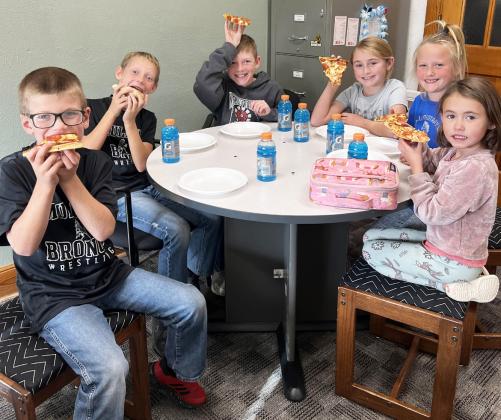 Pictured around the table, l-r: Cooper Ourada, Eli Barnes, Duke Miller, Avery Vinton, Danielle Peterson, Addison Mundorf. Brett Mauler