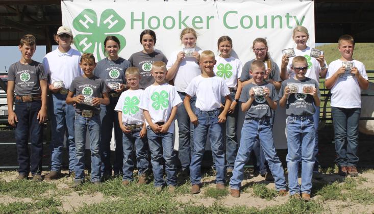 4-Hers who showed livestock are pictured back, l-r: Hunter Brown, Daniel Wright, Izabella Brown, Fayth Brown, Hayley Donohoe, Kalli Licking, Hope Miller, Faith Miller, Hayden Deibler. Front: Gunner Brown, Ryden Ourada, Weston Ourada, Teal Peterson, Duke Miller, Oakes Miller. Gerri Peterson