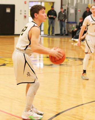 Hunter Brown prepares to attempt a three-point shot last Friday. Carolee Brown