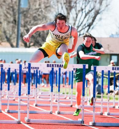 Chase Gracey on his way to the gold medal in the 110 hurdles. Megan Andersen