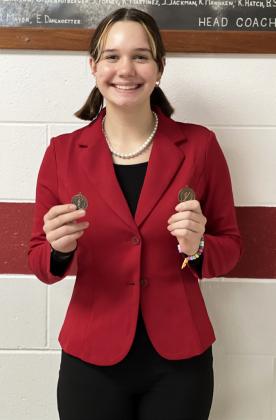 Simonson places at first speech meet