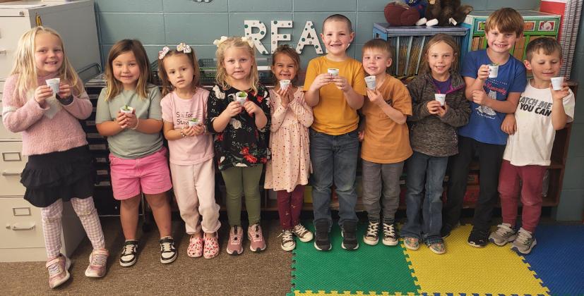Mrs. Jewell and the 7th grade girls brought the kindergartners baby plants and taught them about plants for their plant unit. Pictured l-r: Harper Barnes, Quinley Schmid, Stevie Johnson, Violet Stichka, Josey Boland, Kane Simmons, Martin Connealy, Emerson Phipps, Clay Cribelli, Johnny Phillips. Leanne DeKay