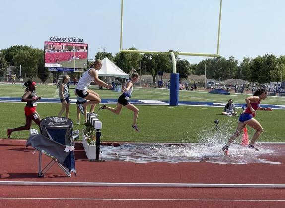 Josey French in midair during the steeplechase at Nationals. Leanne French