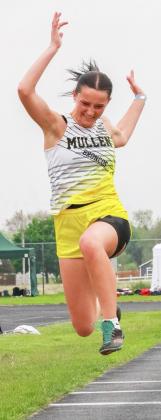 Fayth Brown gives it her all in the triple jump. Carolee Brown