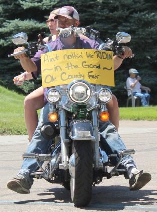 Shane Daniels with passenger Samantha Cheever - 1st place in Best Decorated Small Vehicle. It was a great fair parade! Find more photos of the parade &amp;amp; other fair events on the Tribune’s Facebook page.
