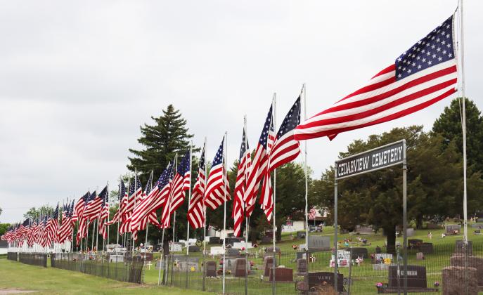 The flags flying at Cedarview Cemetery in Mullen over Memorial Day weekend. Every flag flown was once on a veteran’s casket, with the name of the veteran sewn onto the seam of the flag.