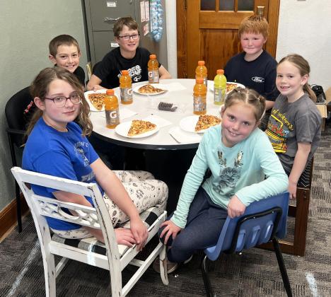 Pictured clockwise around the table from the top left: Grady Phipps, Cylas Dent, Lane Brown, Kinley Crisp, Aislynn Connealy, Taylor Cash. Brett Mauler