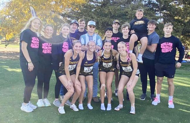 The Lady Broncos placed 6th out of 17 Class D girls cross country teams competing at state last week. They are pictured surrounded by their peers who were in Kearney cheering them on. Megan Andersen