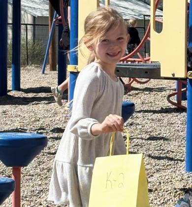 Brystol Call and Harper Myers are pictured at the Easter Egg Hunt held for elementary students by the Mullen Commercial Club last week. Kara Connealy
