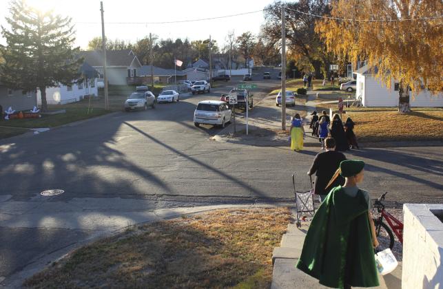 Trick-or-treaters could be seen for blocks down Mullen’s streets on a perfect Halloween evening Monday. At many houses those handing out candy were also out enjoying the weather, sitting on their steps, porches and decks. Gerri Peterson