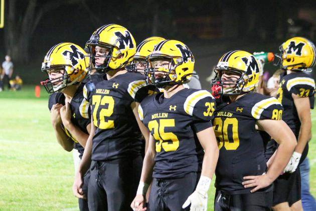 Players on the sideline intently watch the action last Thursday night, l-r: Colby Kessler, Hayden Morrison, Jack Coble, Cody Walker and DJ Coetzee. Carolee Brown Photography