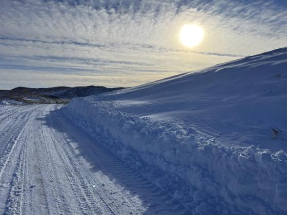 Extra appreciation was felt last week for county and state road departments, emergency personnel and linemen by those who lost power during the blizzard. This county road picture was taken by Belinda Coble last Saturday.