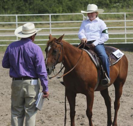 Kassidy Cheever listens to the judge at the 4-H Horse Show. Gerri Peterson