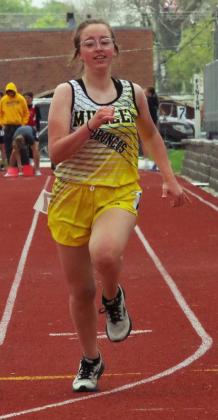 L-r: Freshmen Owen Thorberg and Malila Oltmer competing the 100 and freshman Luke Durfee competing in the 400. Barb McIntosh