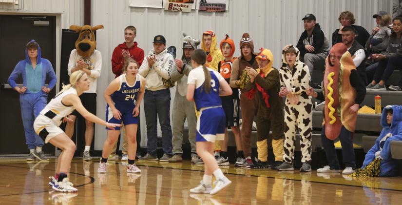 The boys and girls basketball teams showed up to support each other last week during MNAC action. Here the boys are pictured at the girls’ game against Hyannis. Megan Andersen