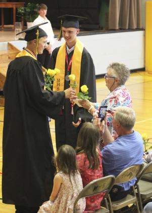 With two grandsons, Alex and Clayton, in the class, Carol Moore had double the rose presentation. Gerri Peterson