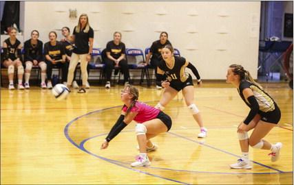 Malia Oltmer, playing libero last Thursday in Arthur, with a dig. Megan Andersen