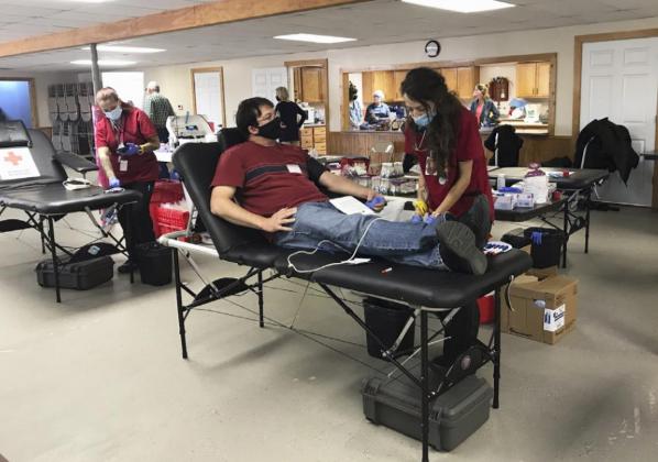 Gerri Peterson Ben Hart waits to donate blood on Monday.