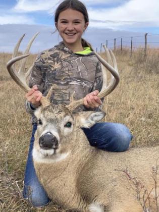 Ady Hampton with her rifle season buck