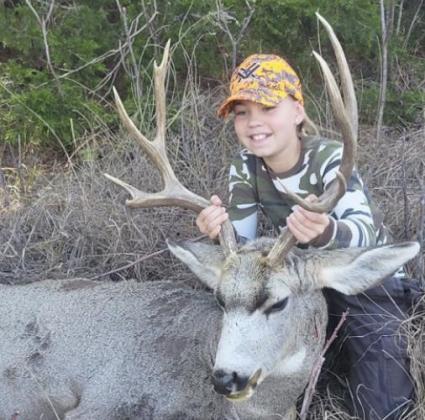 Donna Harding with her first deer ever taken by a 150 yard shot with a 6.5 Grendel