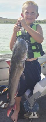 Caleb Deibler with his 15 pound catfish at Merritt